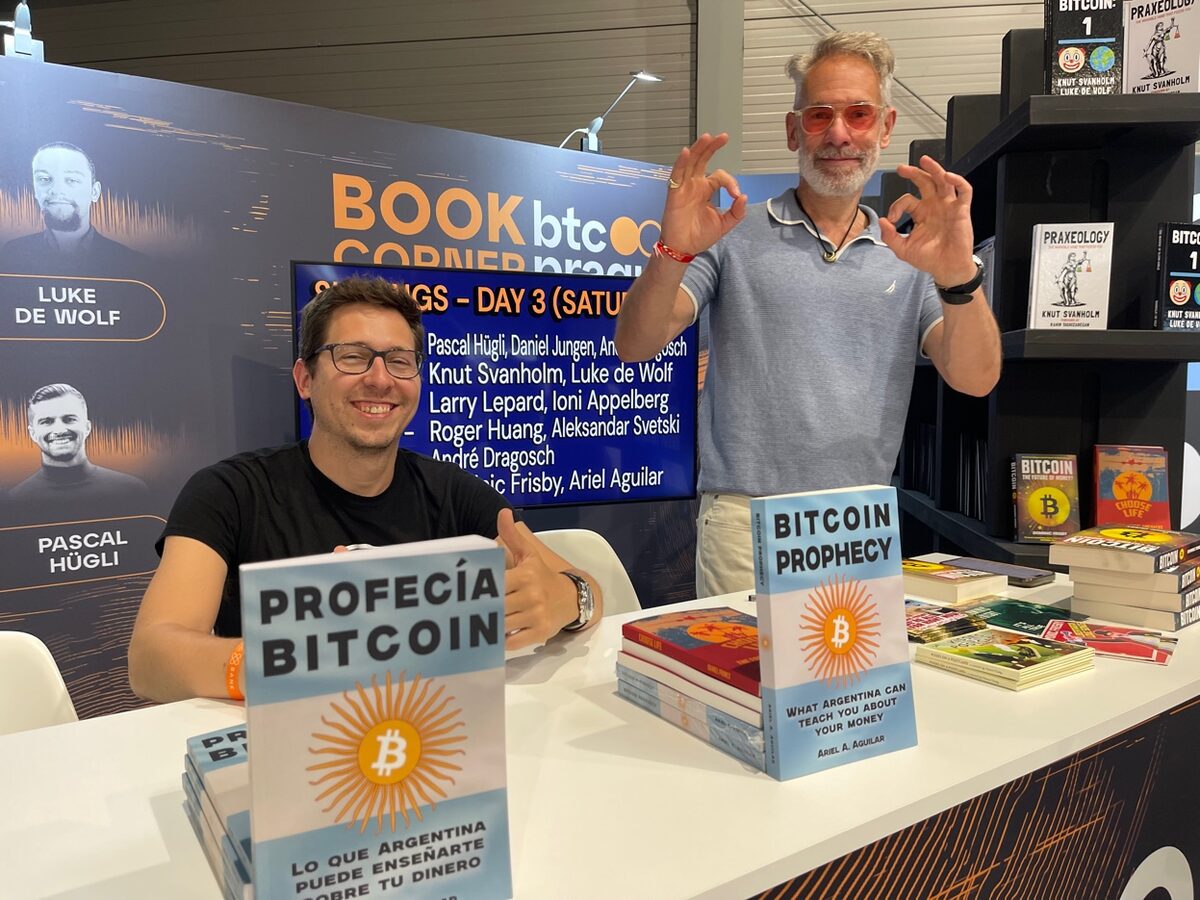 Ariel Aguilar signing Bitcoin Prophecy books